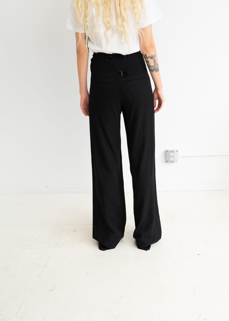 Ann Demeulemeester black loose trousers with orange waistband and